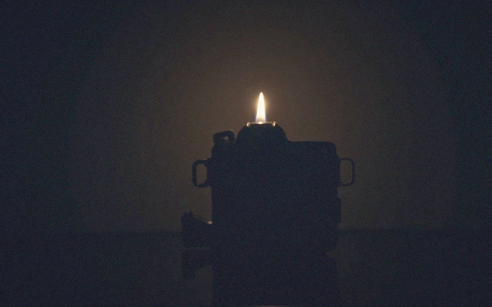 Candlelit still life evoking the director's creative hand